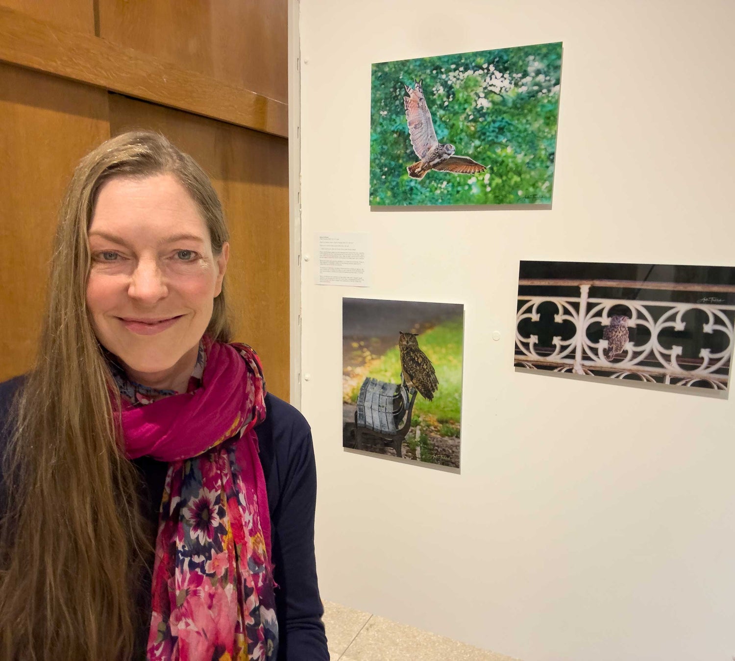 Anke Frohlich standing next to three of her Flaco images at the Earth in the Balance exhibit, March/April 2026, NYC.